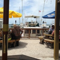 Photo taken at Snooks Bayside Restaurant and Tiki Bar by Bernie S. on 4/29/2013