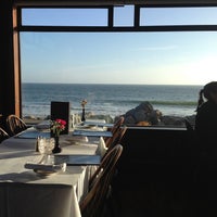 Photo taken at Miramar Beach Restaurant by Sandy L. on 5/14/2013