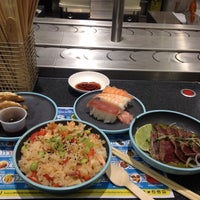 Photo taken at YO! Sushi by Berk M. on 6/9/2014