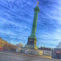 Photo taken at Place de la Bastille by Stéphanie on 12/19/2015