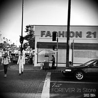 Photo taken at Fashion 21 by Jane A. on 6/22/2013