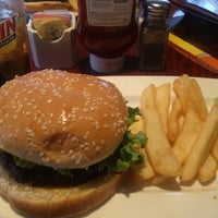 Photo taken at Red Robin Gourmet Burgers and Brews by Jarred D. on 5/10/2013