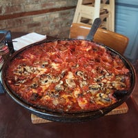 Photo taken at Pequod&#39;s Pizzeria by Gigi T. on 10/14/2023