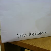 Photo taken at Calvin Klein Jeans by Anastasia K. on 8/5/2013