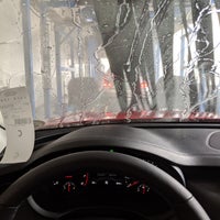 Photo taken at Gleam Car Wash by Paola R. on 6/25/2019