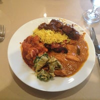 Photo taken at Taj Mahal Indian Cuisine by Lucius M. on 1/1/2013