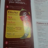 Photo taken at Nando&amp;#39;s by Amy S. on 5/12/2013