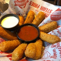 Photo taken at Red Robin Gourmet Burgers and Brews by Kevin H. on 6/24/2019