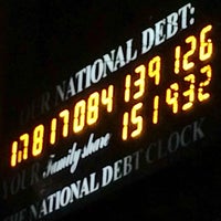 Photo taken at National Debt Clock by Ingvar P. on 3/4/2015