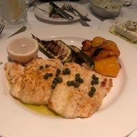 Photo taken at Rib N Reef Steakhouse by Andrew C. on 3/7/2019