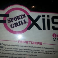 Photo taken at Foxiis Sports Grill by Lisa P. on 6/1/2013