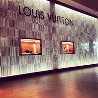 Photo taken at Louis Vuitton by Igor A. on 12/21/2012