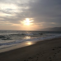 Photo taken at Zuma Beach by Dmitry M. on 5/10/2013