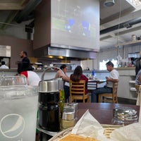 Photo taken at Eatalian Cafe by Andrew P. on 8/28/2022