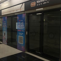 Photo taken at Marina Bay MRT Interchange (NS27/CE2/TE20) by A H. on 12/1/2022