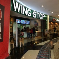 Photo taken at WING•STOP by A H. on 1/26/2017