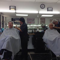 Photo taken at Rios&#39;s Barbershop by Sounun T. on 3/21/2015