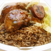 Photo taken at Golden Krust Caribbean Restaurant by Richard G. on 10/11/2012