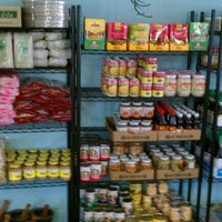 Photo taken at Waialua Fresh grocery store by Jason S. on 4/1/2011