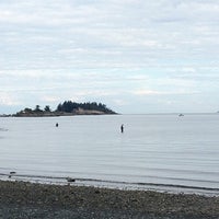 Photo taken at Departure Bay Beach by Miso H. on 8/22/2012