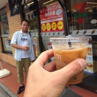Photo taken at 7-Eleven by Munetoshi T. on 7/24/2014