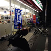 Photo taken at Lawson Store 100 by Munetoshi T. on 5/23/2014