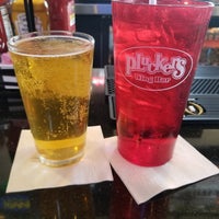 Photo taken at Pluckers Wing Bar by Angela C. on 12/10/2018