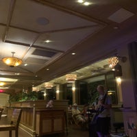 Photo taken at Tommy Bahama Tropical Café by Raj S. on 9/8/2021