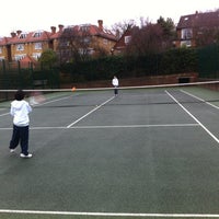 Photo taken at Holland Garden Park Tennis Courts by Kevin Y. on 12/23/2012