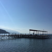 Photo taken at Ohrid Beach by Serkan B. on 9/29/2016