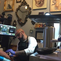 Photo taken at Evermore Tattoo by Jennifer M. on 12/11/2015