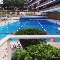 Photo taken at Oasis Outdoor Swimming Pool by Merve D. on 7/12/2015