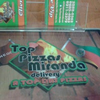 Photo taken at Top Pizzas Miranda by Flávio M. on 3/10/2015