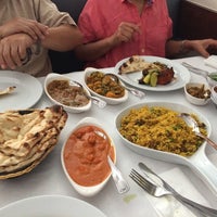 Photo taken at Asha Indian Restaurant by JoJo P. on 7/6/2014