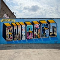 Photo taken at Greetings from Chicago (2015) mural by Victor Ving and Lisa Beggs by Wilson Y. on 5/14/2022