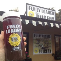 Photo taken at Fully Loaded Micro Juicery by January J. on 2/17/2014