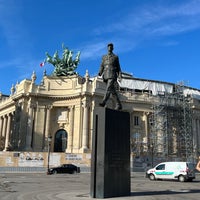 Photo taken at Statue de Charles de Gaulle by Victor M. on 8/2/2022