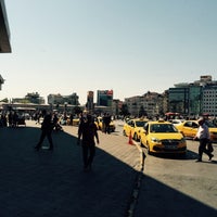 Photo taken at Taksim Square by Furkan C. on 5/13/2015