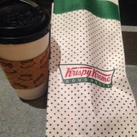 Photo taken at Krispy Kreme Doughnuts by Rj E. on 4/12/2014