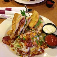 Photo taken at Boston Pizza by Alicia-Marie L. on 12/15/2012