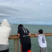 Photo taken at Cocoa Beach Pier by Claudette C. on 1/28/2023