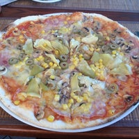 Photo taken at Pizzeria La Trattoria by Veronika Z. on 9/15/2012