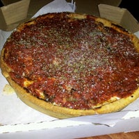 Photo taken at Kylie&amp;#39;s Chicago Pizza by Meee M. on 11/28/2012