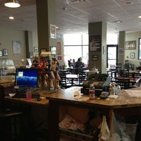 Photo taken at Roc River Coffee Company by Jason B. on 12/26/2012