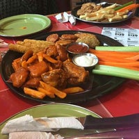 Photo taken at Sports Ribs &amp;amp; Wings by Malu R. on 9/24/2016