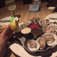 Photo taken at Sterling&amp;#39;s Seafood Steakhouse by Xuan L. on 6/15/2015