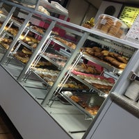 Photo taken at Fresh Donuts by Giselle M. on 12/25/2012