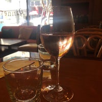 Photo taken at Aquitaine Wine Bistro by Emily T. on 4/22/2019