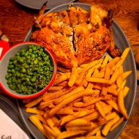 Photo taken at Nando&amp;#39;s by Chioma C. on 1/8/2022
