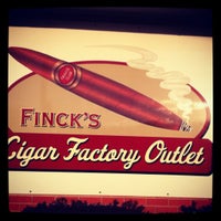 Photo taken at Finck&amp;#39;s Cigar Factory Outlet - West Ave. by T.J. M. on 11/9/2012